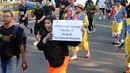 PaSKI (Persatuan Seniman Komedi Indonesia) melakukan kampanye Hari Komedi Nasional yang jatuh setiap tanggal 27 Oktober di sekitar Jenderal Sudirman, Jakarta, Minggu (21/9/2025). (Kapanlagi.com/Budy Santoso)