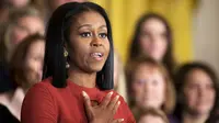 Michelle Obama saat sampaikan pidato terakhirnya sebagai Ibu Negara AS (AP)