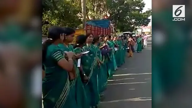 Jutaan perempuan di India membuat dinding manusia sepanjang 600 kilometer sebagai bentuk protes terhadap kecaman perempuan masuk ke kuil suci.