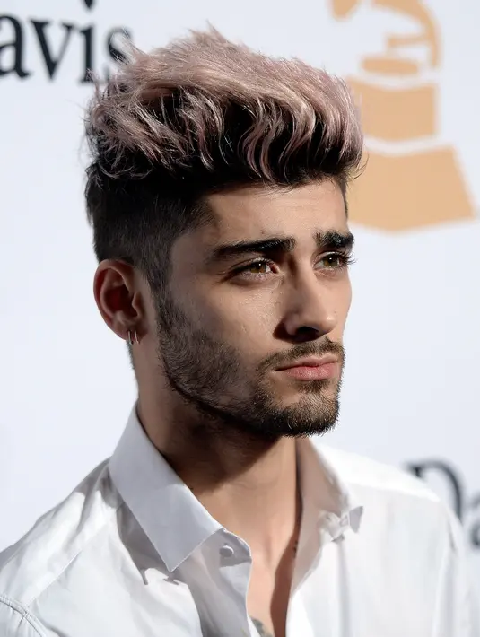 Namun hingga saat ini Zayn Malik tidak mau memikirkan tentang kejadian tersebut. Ia tetap fokus menjalani kariernya dan kekasihnya Gigi Hadid. (AFP/Bintang.com)