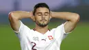 Pemain Swiss, Loris Benito, tampak kecewa usai gagal mencetak gol ke gawang Spanyol pada laga UEFA Nations League di Stadion Alfredo di Stefano, Minggu (11/10/2020). Spanyol menang dengan skor 1-0. (AP Photo/Manu Fernandez)