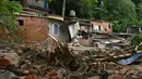 Pemandangan daerah yang terkena banjir di distrik Juquehy di Sao Sebastiao, negara bagian Sao Paulo, Brasil (20/2/2023). Pemerintah negara bagian Sao Paulo dalam pernyataannya pada Minggu (20/2) waktu setempat menyebut sedikitnya 35 orang tewas di kota Sao Sebastiao dan satu orang lainnya, yang merupakan bocah perempuan berusia 7 tahun, tewas di wilayah Ubatuba.
(AFP/Nelson Almeida)