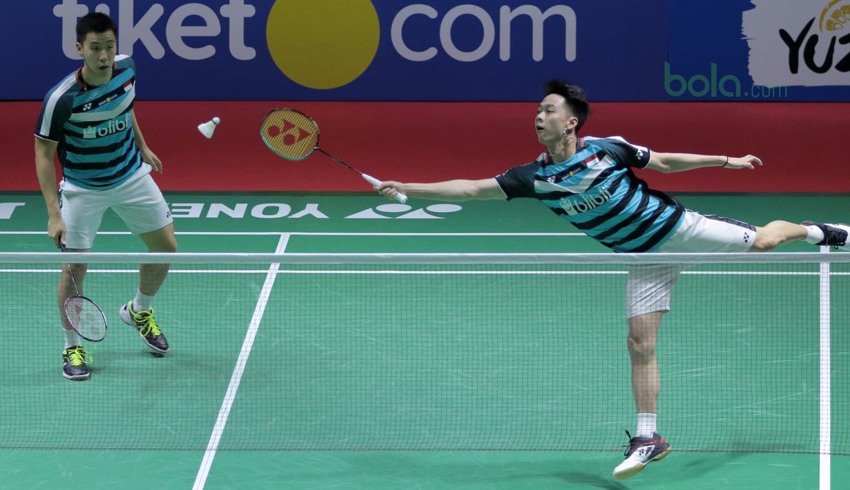 Kevin Sanjaya/Marcus Gideon saat melawan Fajar Alfian/Rian Ardianto pada semifinal Indonesia Open 2018 di Istora Senayan, Jakarta, (7/6/2018). Kevin/Marcus menang 21-13, 21-10. (Bola.com/Nick Hanoatubun)