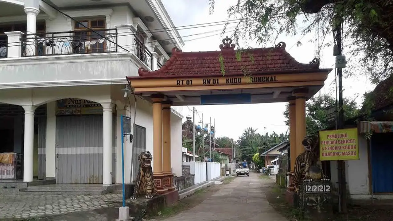 Patung macan lucu