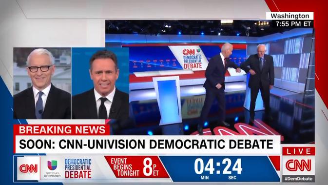 Mantan Wapres AS Joe Biden dan Senator Bernie Sanders melakukan salam bahu (elbow bump) untuk menghindari Virus Corona (COVID-19). Dok: CNN