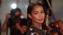 Laura Harrier berpose untuk fotografer setibanya pada pemutaran perdana film 'The Whale' dalam Venice Film Festival edisi ke-79 di Venesia, Italia, 4 September 2022. Laura menambahkan eyeshadow metalik yang pas dan bibir nude yang mengkilap. (Photo by Joel C. Ryan/Invision/AP)
