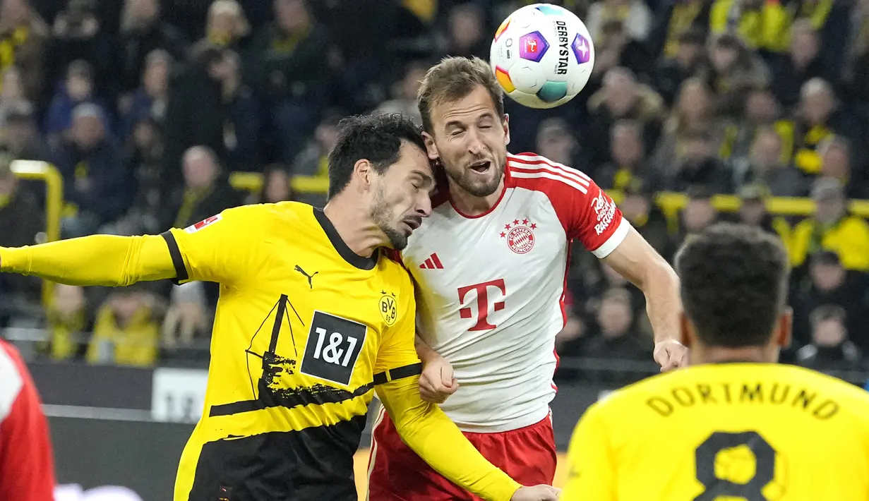 Tiga gol ke gawang Dortmund membuat Kane sudah mengoleksi total 15 gol di Bundesliga sejauh ini. (AP Photo/Martin Meissner)