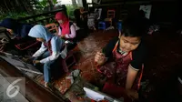 Sejumlah anak belajar melukis di Taman Pintar Yogyakarta, Selasa (12/7). Meski liburan lebaran telah berahir, liburan sekolah masih menyisakan satu pekan. (Liputan6.com/Boy Harjanto)