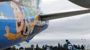 Ekor pesawat Alaska Airlines dicat dengan dengan tema khusus dari salah satu film yang diproduksi Pixar Animation Studios di Bandara Internasional Seattle-Tacoma, Seattle pada 7 Oktober 2019. Pesawat Boeing 737-800 milik maskapai tersebut menampilkan tokoh dari Toy Story. (AP Photo/Ted S. Warren)