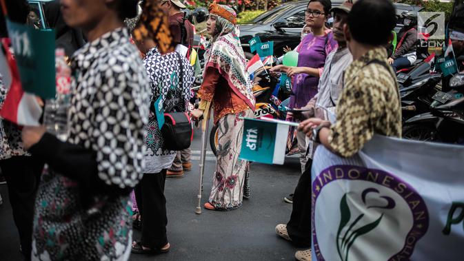 Penyandang disabilitas mengikuti pawai budaya di kawasan MH Thamrin, Jakarta, Selasa (27/8/2019). Kegiatan bertema 