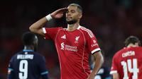 Cody Gakpo mencetak gol dalam duel pramusim Liverpool versus Athletic Club di Anfield, Selasa (5/8/2025) dini hari WIB. (Darren Staples/AFP)