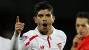 8. Gelandang Sevilla,Ever Banega, merayakan gol yang dicetaknya ke gawang Getafe pada laga La Liga Spanyol di Stadion Coliseo Alfonso Perez, Sabtu (5/3/2016). Kedua tim bermain imbang 1-1. (EPA/Javier Lizon)