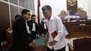 Terdakwa kasus obstruction of justice atau upaya untuk menghalang-halangi suatu proses hukum pada kasus pembunuhan Brigadir Nofriansyah Yosua Hutabarat atau Brigadir J, Hendra Kurniawan saat menjalani sidang lanjutan dengan agenda pembacaan tuntutan oleh Jaksa Penuntut Umum di Pengadilan Negeri Jakarta Selatan, Jumat (27/1/2023). Mantan Karo Paminal Propam Polri tersebut dituntut 3 tahun penjara denda Rp 20 juta subsider 3 bulan kurungan penjara. (Liputan6.com/Johan Tallo)