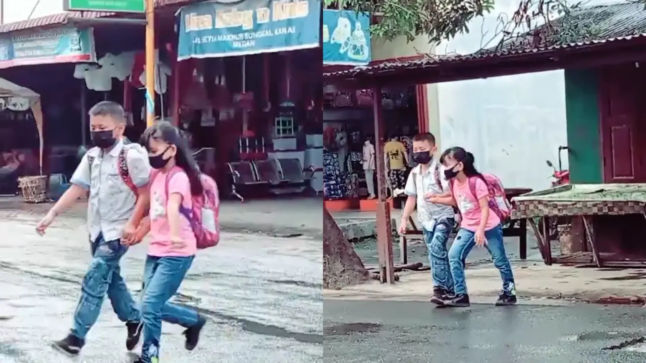 Potret romantis dua bocah menyebrang jalan.