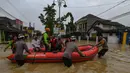 Banjir yang terjadi di kawasan perbatasan Bogor dan Bekasi akibat luapan Kali Cikeas dan Cileungsi. (merdeka.com/Arie Basuki)