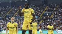 Selebrasi gelandang&nbsp;AC Milan&nbsp;Youssouf Fofana&nbsp;usai menjebol&nbsp;gawang Udinese di Bluenergy Stadium pada pekan keempat Serie A 2025/2026, Minggu (21/09/2025). (Andrea Bressanutti/LaPresse via AP)