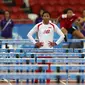 Pelari putri Indonesia, Dedeh Erawati, bersiap menghadapi final lari gawang 100m putrii SEA Games yang berlangsung di Stadion Nasional Singapura. Kamis (11/6). (Bola.com/Arief Bagus)