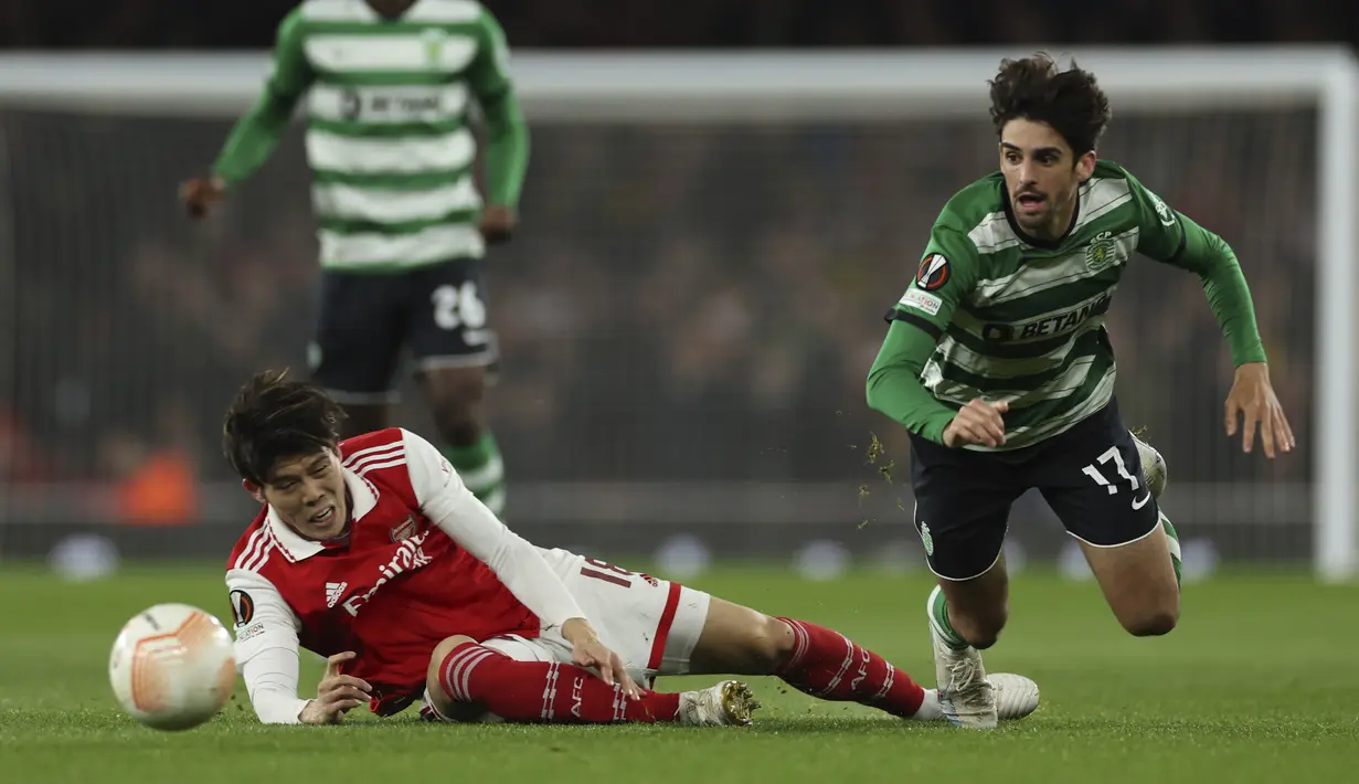 <p>Berkat hasil ini, Sporting Lisbon berhak melenggang ke babak perempat final untuk melengkapi tujuh tim lainnya yang lebih dahulu sudah memastikan lolos. (AP Photo/Ian Walton)</p>