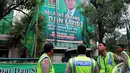 Petugas anggota kepolisian berjaga-jaga di sekitar Kantor DPP PPP di Jalan Diponegoro, Menteng, Jakarta Pusat, Selasa (2/12/2014). (Liputan6.com/Johan Tallo)