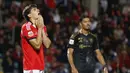 Benfica tak mampu menambah gol hingga akhir laga dan membuat skor 1-1 bertahan hingga wasit meniup peluit tanda akhir pertandingan. (AFP/Filipe Amorim)