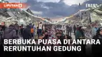RATUSAN WARGA PALESTINA BERBUKA PUASA DI ANTARA RERUNTUHAN DI KOTA RAFAH