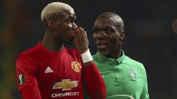  Jose Mourinho, meyakini duel Pogba bersaudara, Florentin dan Paul Pogba pada leg pertama 32 besar Liga Europa akan membuat sang ibu pusing. Sebab, ibu Pogba bakal sulit mendukung salah satu dari dua anaknya tersebut. (AP/Dave Thompson)