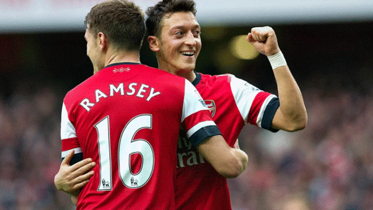 Aaron Ramsey dan Mesut Ozil (Liputan6.com)