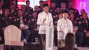 Capres dan Cawapres nomor urut 01 Joko Widodo-Ma'ruf Amin saat Debat Capres Pilpres 2019 pertama di Hotel Bidakara, Jakarta, Kamis (17/1). Debat perdana ini mengangkat tema hukum, hak asasi manusia, terorisme, dan korupsi. (Liputan6.com/Faizal Fanani)