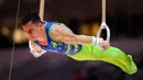 <p>Pesenam Brasil, Caio Souza beraksi pada nomor gelang-gelang final aparatus putra Kejuaraan Dunia Gimnastik 2025 di Indonesia Arena, Senayan, Jakarta, Jumat (24/10/2025). (Bola.com/Bagaskara Lazuardi)</p>