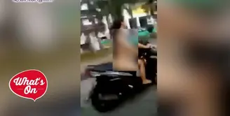 Seorang wanita yang diduga stres naik motor ke bandara Supadio tanpa busana. Aksinya ini sempat membuat geger warga sekitar.