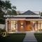 Model Rumah Minimalis dengan Atap Datar dan Rooftop Kecil. Foto: Gemini