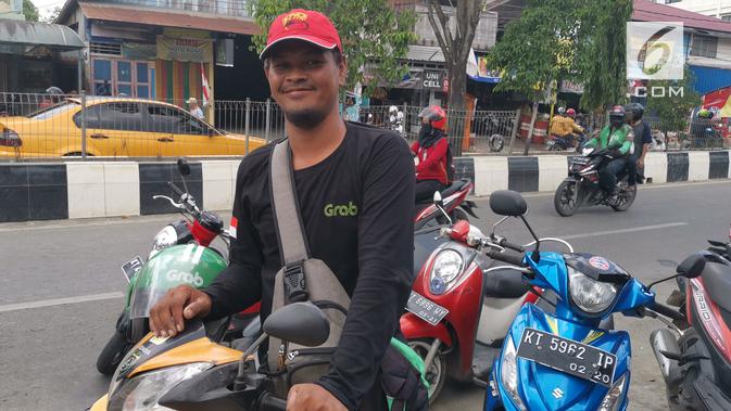 Bambang Indrayanto, mitra driver Grab Bike saat ditemui di Samarinda, Kalimantan Timur. (Liputan6.com/ Andina Librianty)