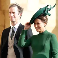 Pippa Middleton bersama suaminya James Matthews (Adrian DENNIS / AFP / POOL)