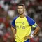 Ekspresi pemain Al Nassr, Cristiano Ronaldo, setelah gawang klubnya kebobolan oleh Benfica dalam pertandingan pramusim yang berlangsung di Estadio Algarve, Portugal, Jumat (21/7/2023) WIB. (AFP/Patricia De Melo Moreira)