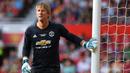 3. Edwin van der Sar - Edwin van der Sar juga tercatat sebagai salah satu kiper terbaik di Liga Inggris bersama Manchester United. Van Der Sar memenangkan 4 gelar Liga Premier Inggris, 2 Piala Liga Inggris, 1 trofi Liga Champions, dan 1 gelar FIFA Club World Cup. (AFP/Paul Ellis)