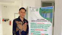 Peserta JKN, Rafki yang juga merupakan seorang Kepala Puskesmas Talu. (Foto: Istimewa)