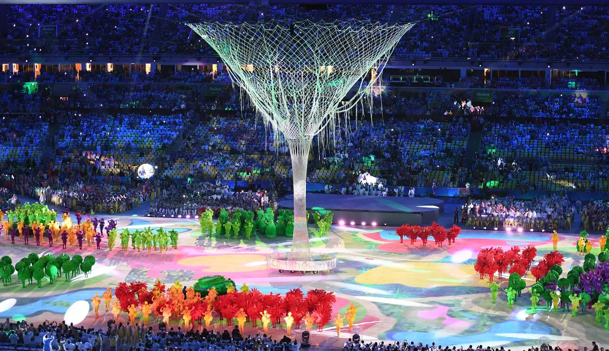 Tarian dengan warna-warni menandai perayaan penutupan Olimpiade Rio 2016  di  Stadion  Maracana, Rio de Janeiro, (22/8/2016). (AFP/Eric Feferberg)