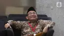 Penasihat Khusus Presiden Bidang Haji, Muhadjir Effendy (kanan), saat menunggu waktu pemeriksaan di Gedung Merah Putih Komisi Pemberantasan Korupsi (KPK), Jakarta, Senin (18/5/2026). (Liputan6.com/Helmi Fithriansyah)