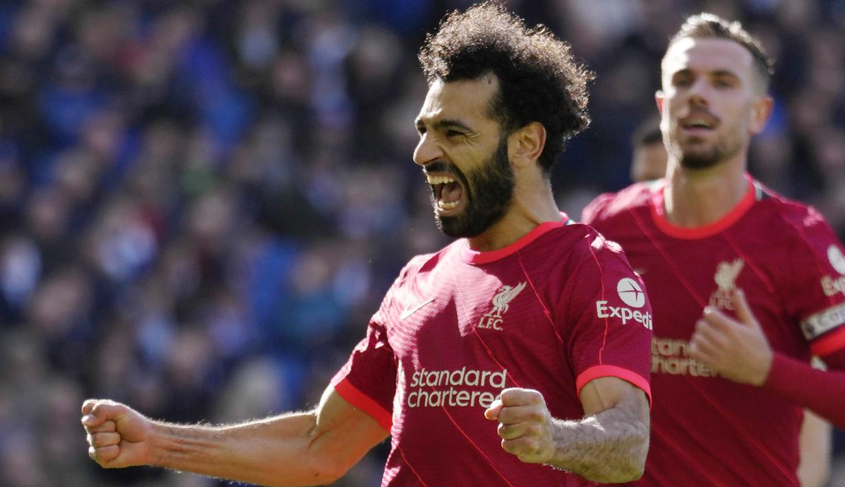 Gol penalti yang dicetak Salah ke gawang Brighton juga membawa Liverpool mencapai sebuah catatan istimewa. Gol itu tercatat sebagai gol ke-2000 The Reds di Premier League. (AP/Kirsty Wigglesworth)