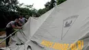 Mulai malam ini, ratusan personel kepolisian tersebut akan melakukan pengamanan gedung Parlemen dengan menginap di tenda-tenda tersebut, Jakarta, (15/10/14). (Liputan6.com/Andrian M Tunay)