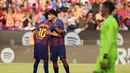 Barcelona langsung menekan sejak menit awal. Gol pembuka Blaugrana dicetak Marc Bernal pada menit ke-4. Tampak dalam foto, gelandang Barcelona asal Spanyol, Marc Bernal (kedua kiri) merayakan golnya bersama Lamine Yamal, selama pertandingan pekan ke-25 La Liga 2025/2026 melawan Levante UD di Stadion Camp Nou, Minggu 22 Februari 2026. (Josep LAGO/AFP)