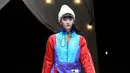 Model berjalan di atas catwalk mengenakan busana karya Yurie Fujita, Katsuya Miyazaki dan Futaba Hongo pada Koleksi Musim Gugur / Musim Dingin 2018 di Tokyo Fashion Week di Tokyo, Jepang (19/3). (AP Photo / Koji Sasahara)