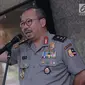 Kadiv Humas Mabes Polri, Irjen Setyo Wasisto memberi keterangan terkait kunjungan Ketua Dewan Pengarah BPIP Megawati Soekarnoputri di Mabes Polri, Jakarta, Rabu (21/3). Kedatangan Megawati adalah bagian dari silaturahmi. (Liputan6.com/Helmi Fithriansyah)