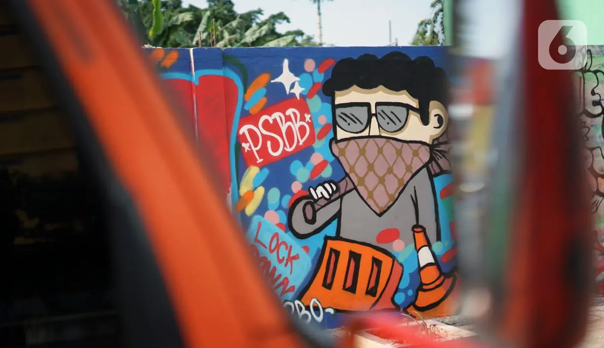Mural bertema pandemi virus corona COVID-19 menghiasi tembok di kawasan Sunter, Jakarta, Selasa (2/6/2020). Mural tersebut dibuat sebagai wujud dukungan terhadap tenaga medis serta masyarakat agar tetap semangat menghadapi pandemi COVID-19. (Liputan6.com/Immanuel Antonius)