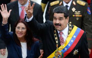 Presiden Venezuela Nicolas Maduro dan istrinya Cilia Flores (AFP Photo/Federico Parra)