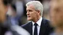 Ekspresi manajer Fulham Mark Hughes sebelum laga lanjutan EPL melawan Blackpool di Craven Cottage, 3 April 2011. AFP PHOTO / GLYN KIRK