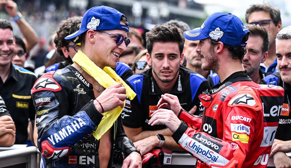 Penentuan juara dunia MotoGP musim 2022 ternyata harus ditentukan hingga seri terakhir yang menjadi seri ke-20 di MotoGP Valencia 2022. Namun bukan musim ini saja hal tersebut terjadi. Tercatat musim ini menjadi musim kelima gelaran MotoGP harus ditetukan hingga seri terakhir untuk memastikan siapa pembalap yang berhak meraih gelar juara dunia. Berikut daftar lengkapnya. (AFP/Mohd Rasfan)