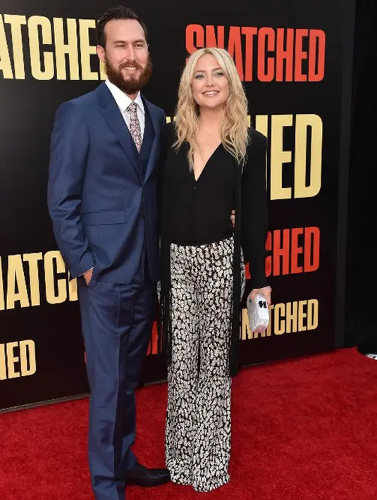 Bukan hanya itu,  yang terpenting bagi Kate adalah Danny bisa menyatu dan akrab dengan keluarganya. Bahkan selera humor yang dimiliki Kate dan Danny pun terbilang sama. (AFP/VALERIE MACON)