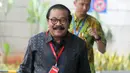 Mantan Gubernur Jawa Timur Soekarwo tiba di Gedung KPK, Jakarta, Rabu (28/8/2019). Soekarwo menyatakan tidak ada persiapan khusus sebelum menjalani pemeriksaan. (merdeka.com/Dwi Narwoko)