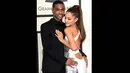 Ariana Grande dan kekasihnya, Big Sean tampak romantis saat berpose di red carpet Grammy Awards 2015 di Staples Center, Los Angeles, AS, Minggu (8/2). (Jason Merritt/Getty Images/AFP)